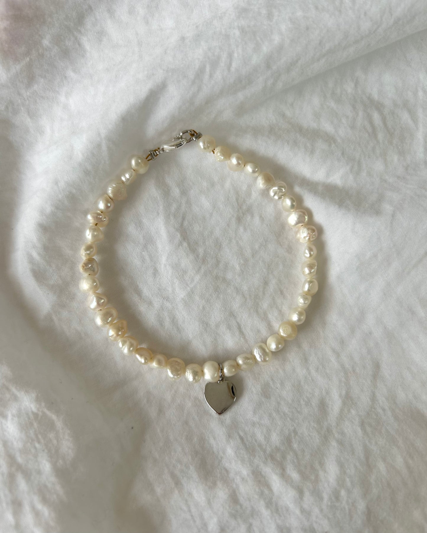 FRESHWATER PEARL HEART CHARM BRACELET IN PLATINUM