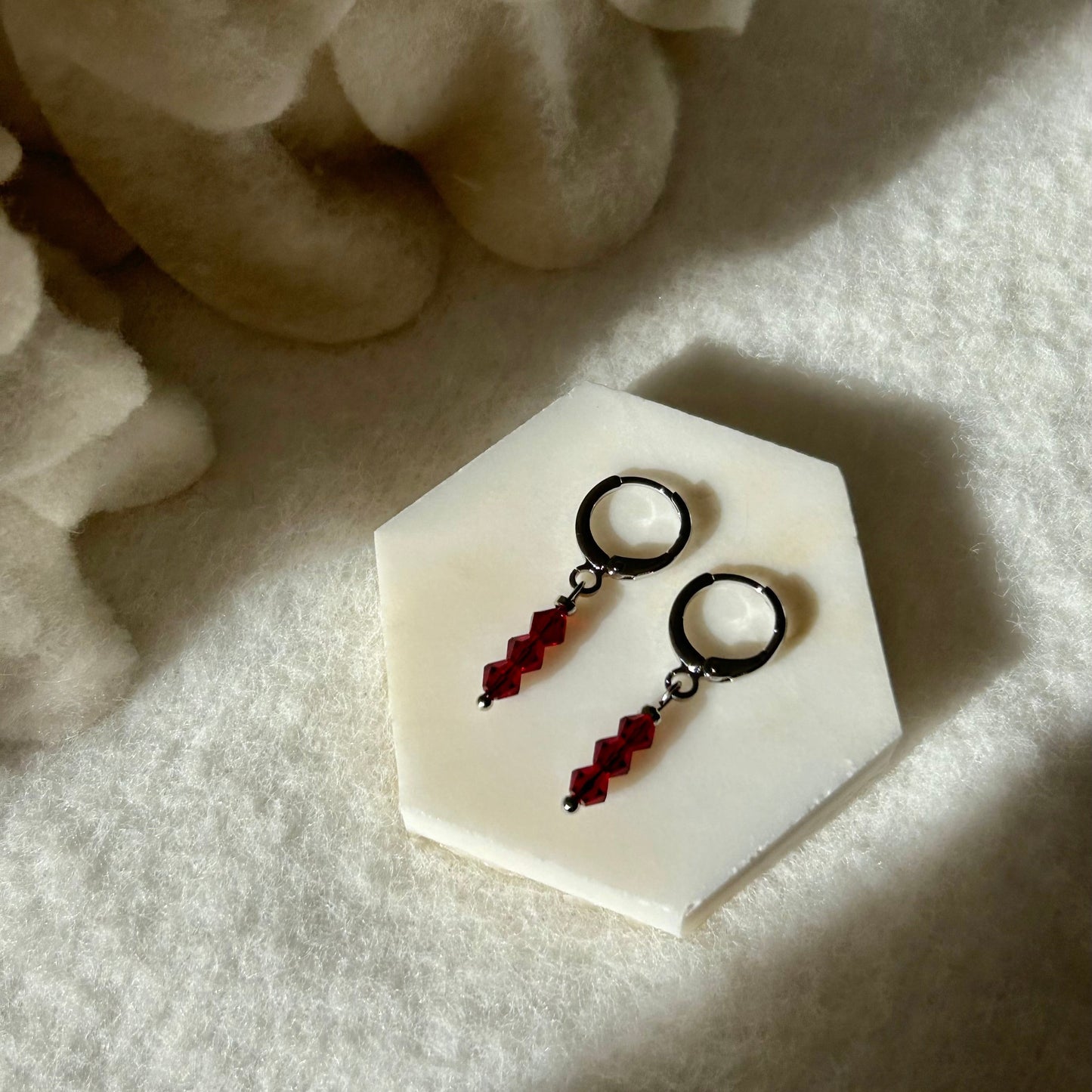 MILLIE RED HUGGIE EARRINGS IN PLATINUM