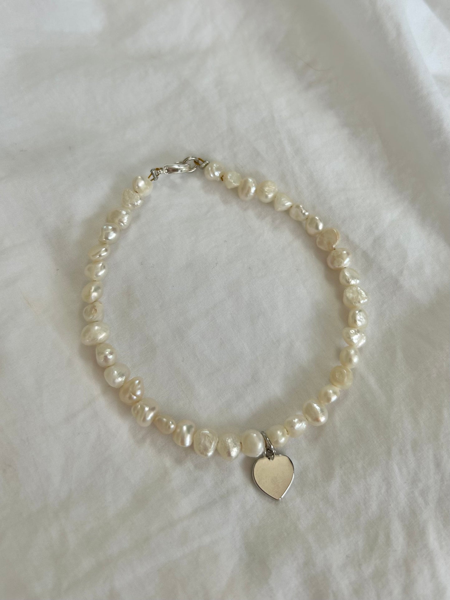 FRESHWATER PEARL HEART CHARM BRACELET IN PLATINUM