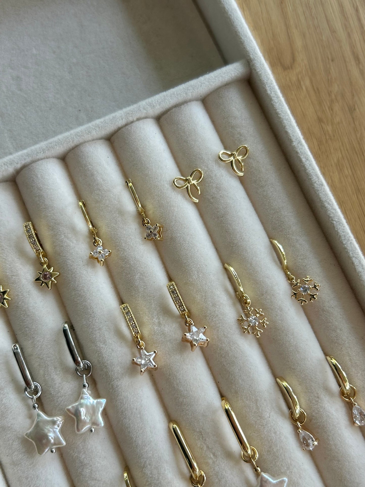 DAINTY SNOWFLAKE HUGGIE EARRINGS IN 18K GOLD