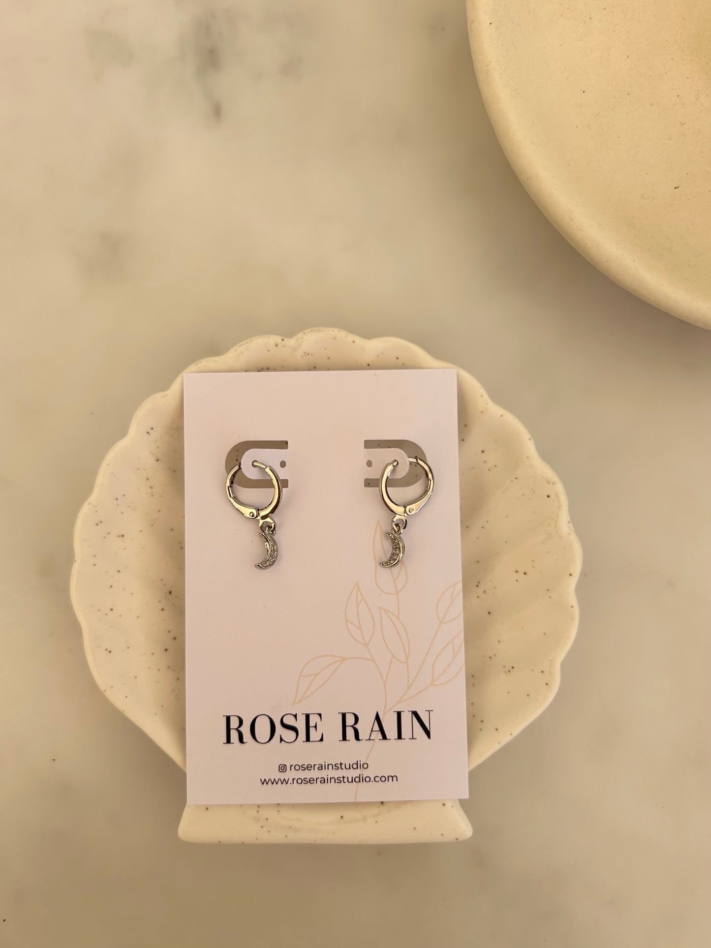 MOON HUGGIE EARRINGS IN PLATINUM