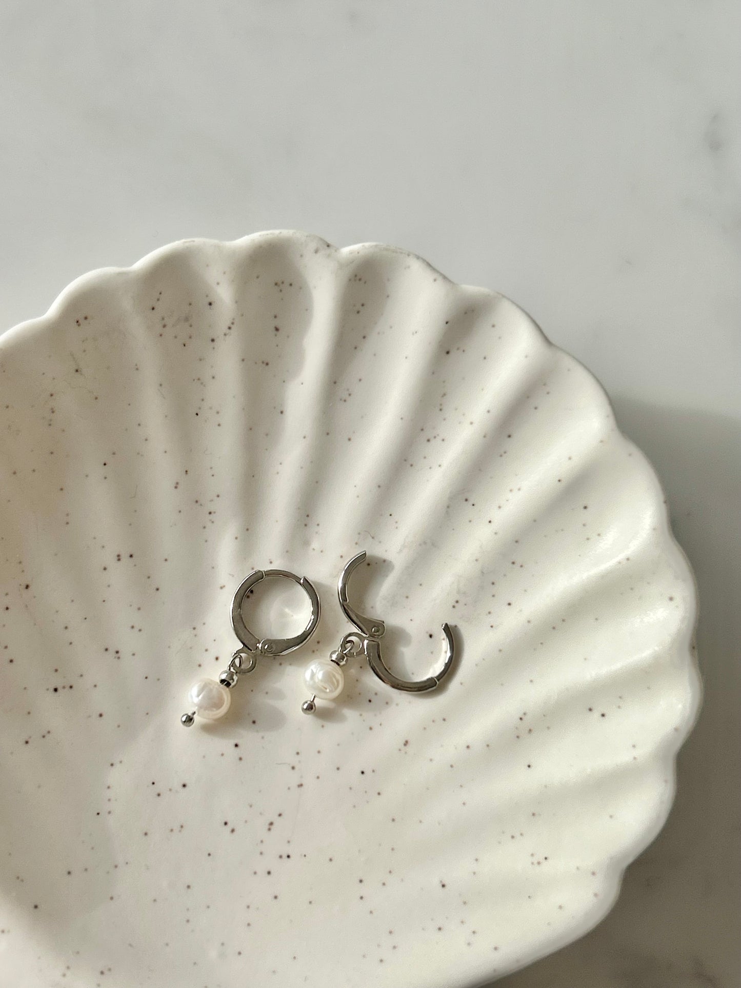 TINY FRESHWATER PEARL HUGGIE EARRINGS IN PLATINUM