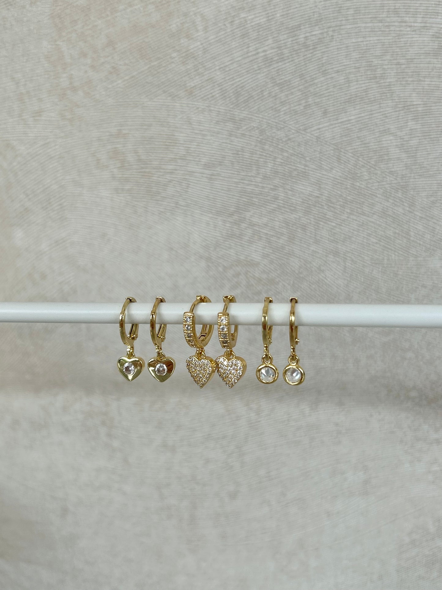 SPARKLE HEART HUGGIE EARRINGS IN 18K GOLD