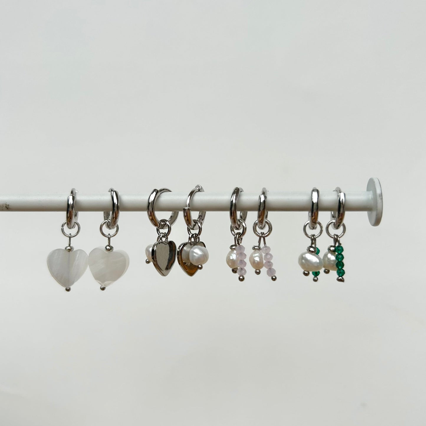DETACHABLE HEART PEARL CHARM HUGGIE EARRINGS IN PLATINUM