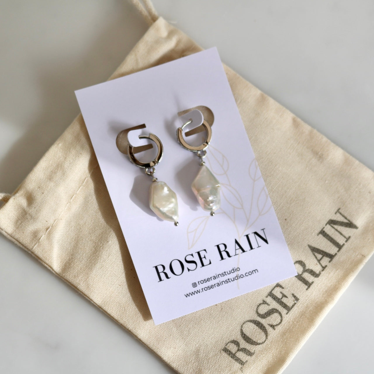BAROQUE PEARL HUGGIE EARRINGS IN PLATINUM
