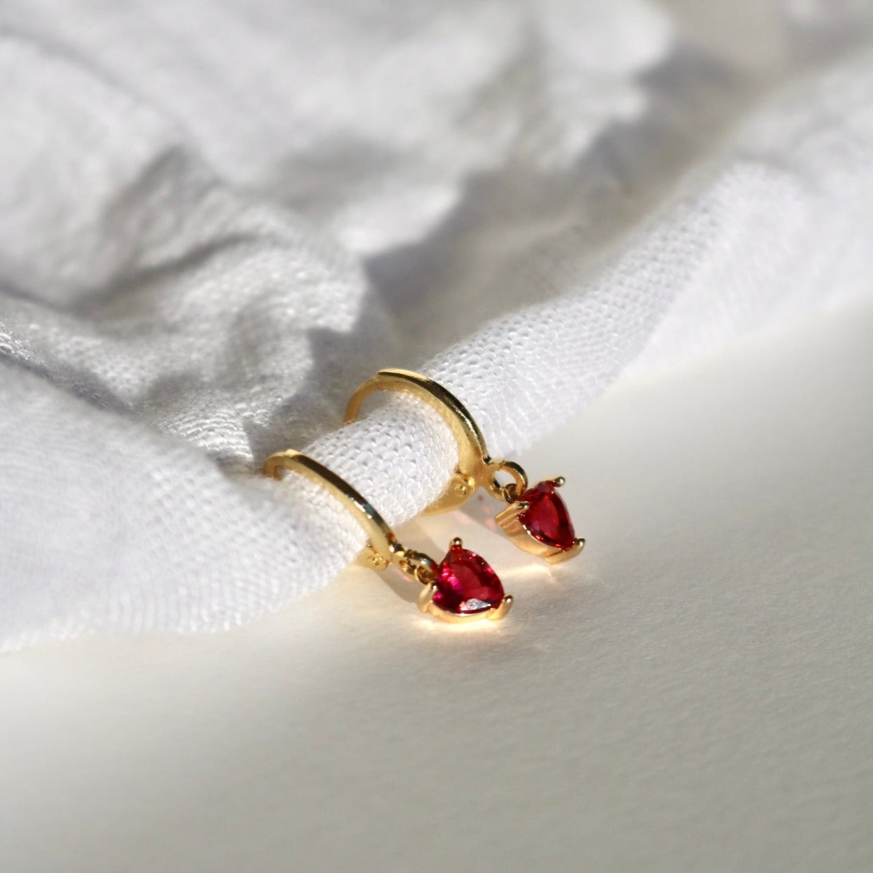 CLIP ON TINY RED HEART HUGGIE EARRINGS IN 18K GOLD