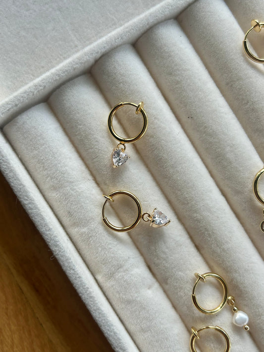 CLIP ON TINY HEART HUGGIE EARRINGS IN 18K GOLD