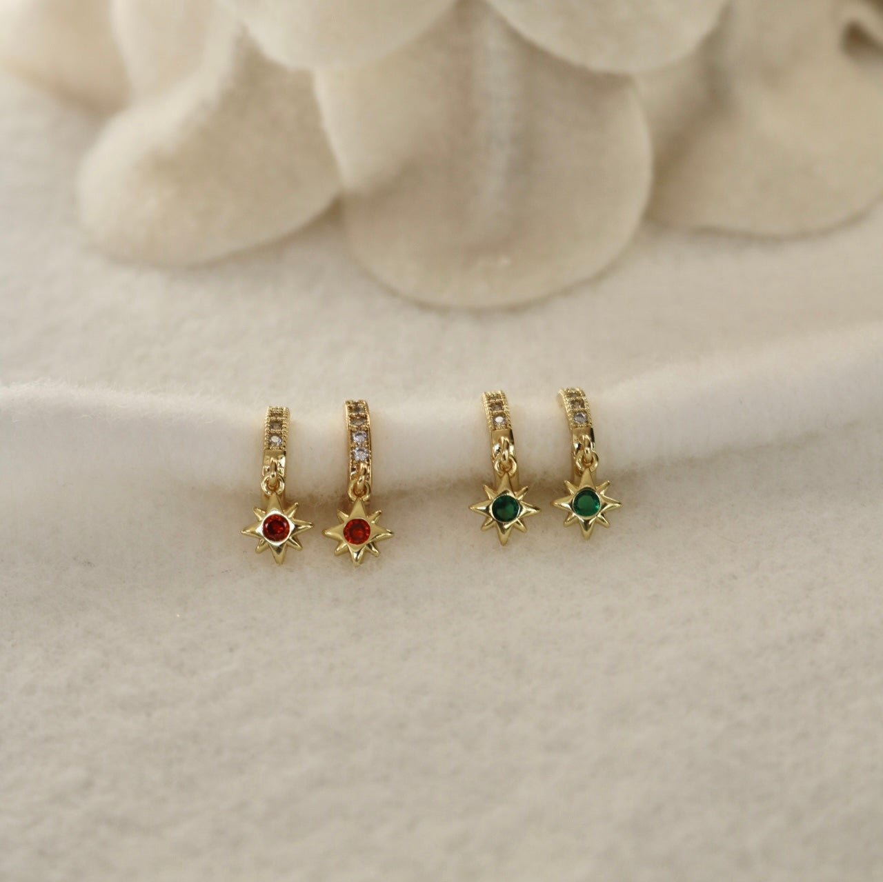 GREEN STAR HUGGIE EARRINGS IN 18K GOLD