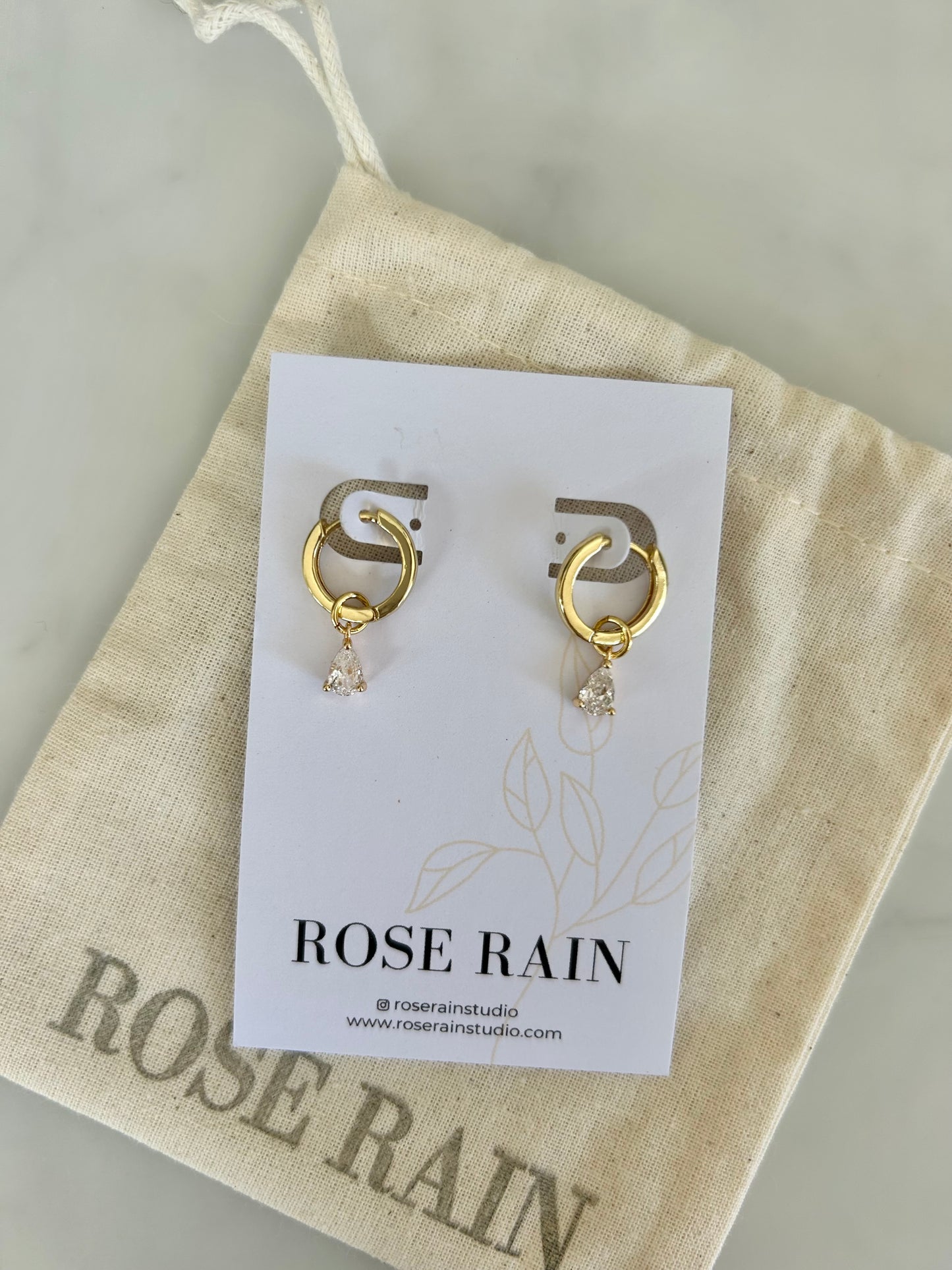 DETACHABLE WHITE TEARDROP CHARM HUGGIE EARRINGS IN 18K GOLD