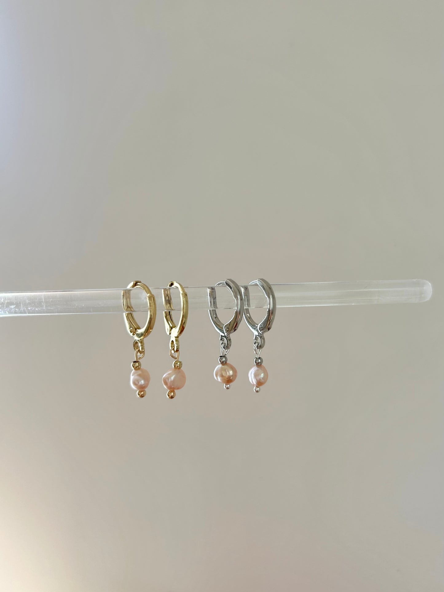 TINY FRESHWATER PINK PEARL HUGGIE EARRINGS IN PLATINUM