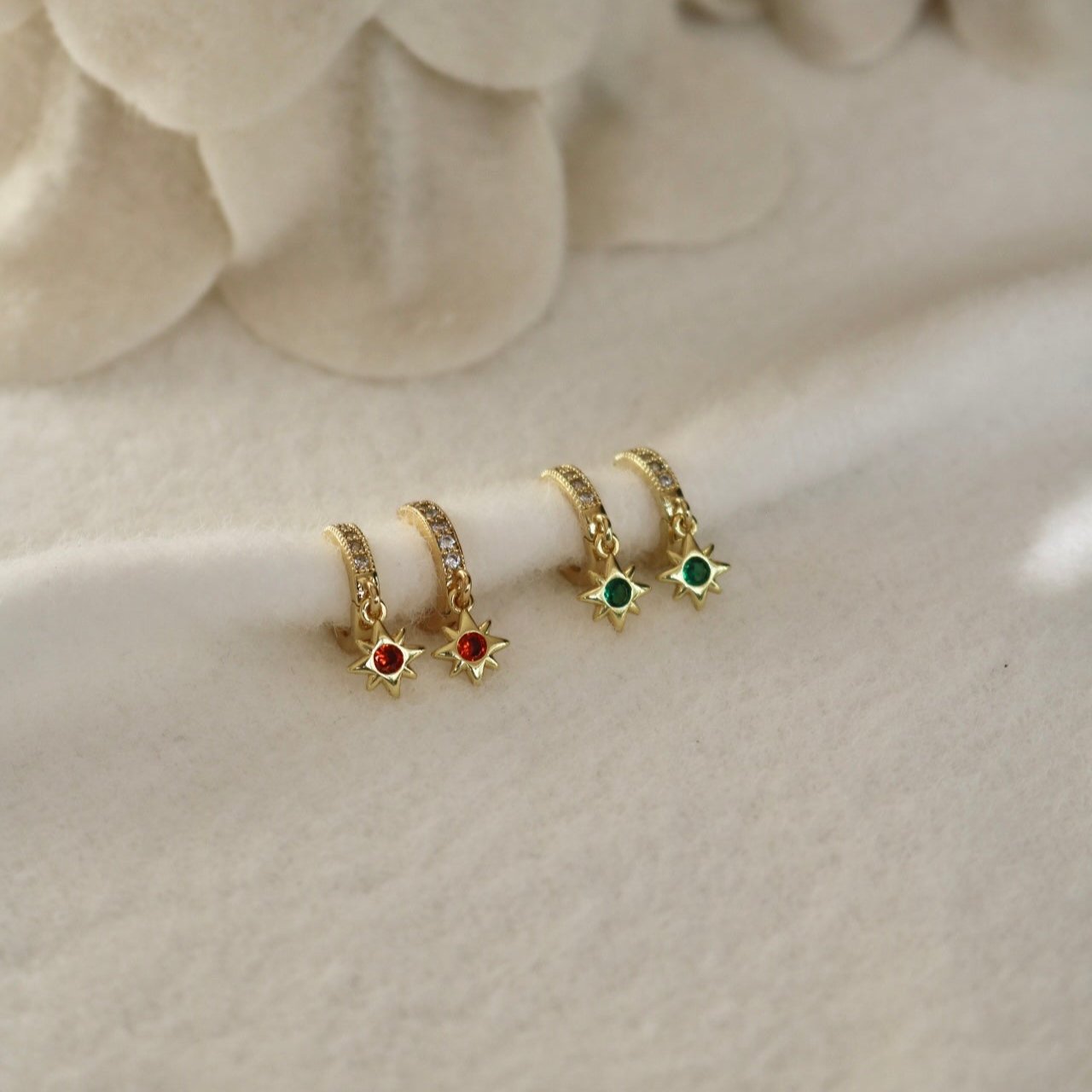 GREEN STAR HUGGIE EARRINGS IN 18K GOLD