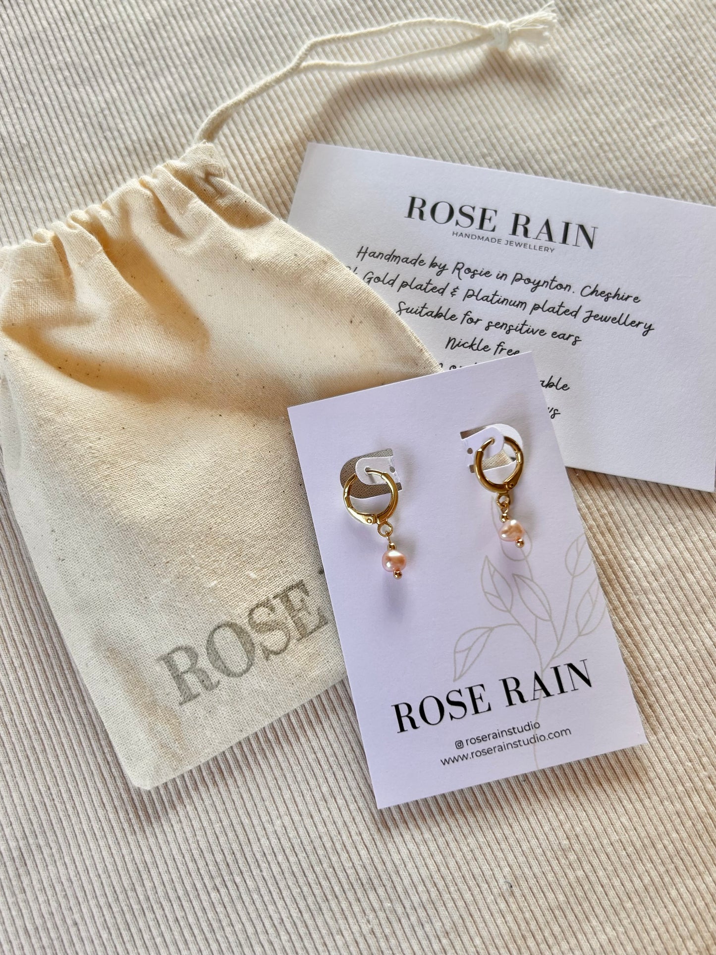 TINY FRESHWATER PINK PEARL HUGGIE EARRINGS IN 18K GOLD