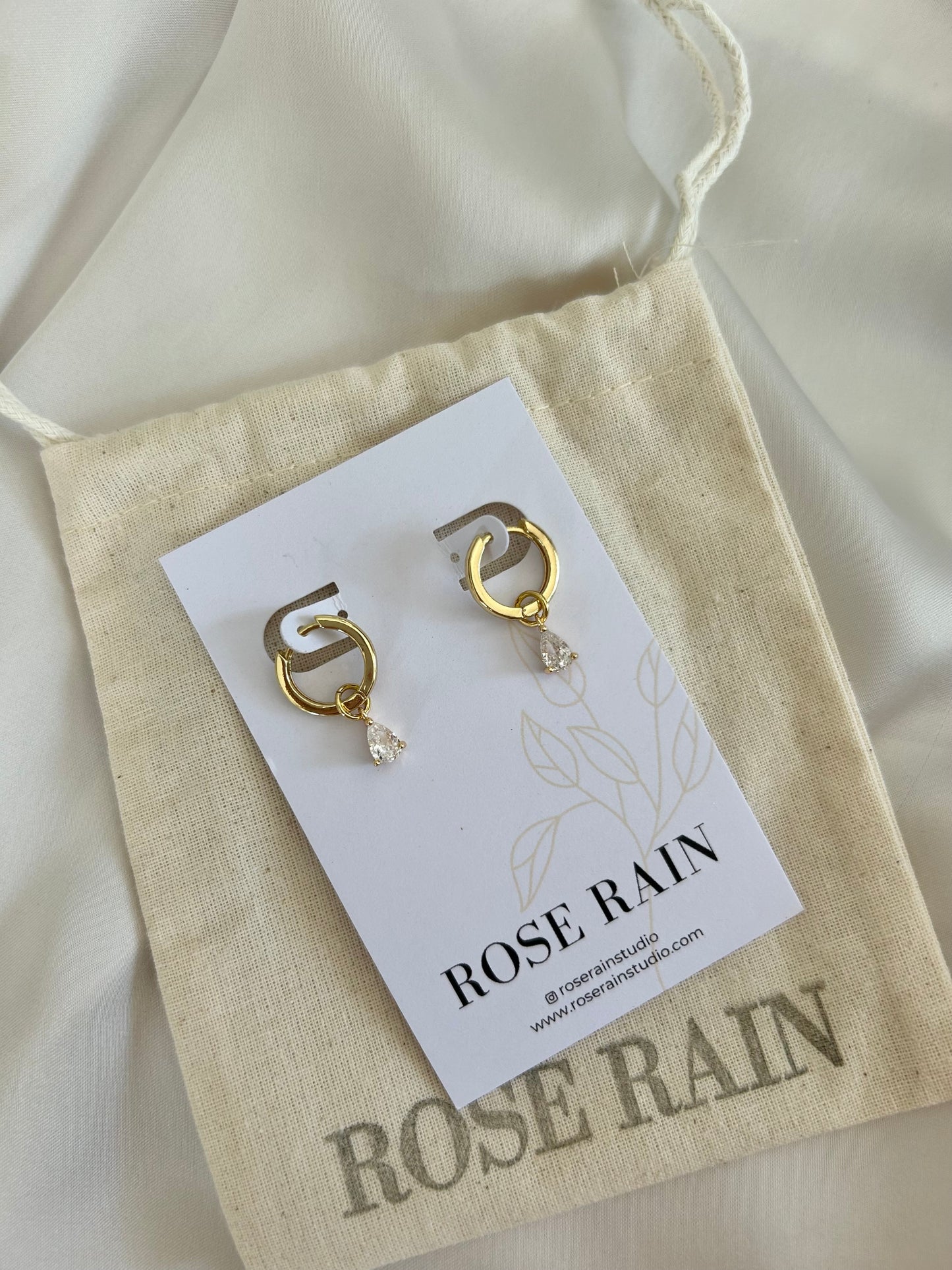 DETACHABLE WHITE TEARDROP CHARM HUGGIE EARRINGS IN 18K GOLD