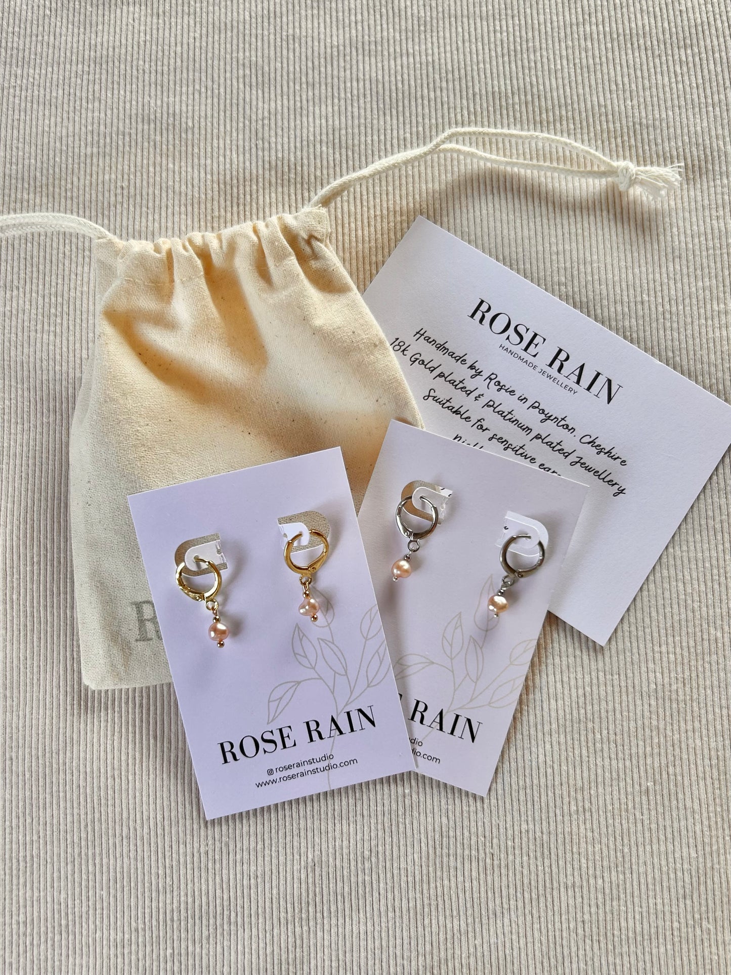 TINY FRESHWATER PINK PEARL HUGGIE EARRINGS IN PLATINUM