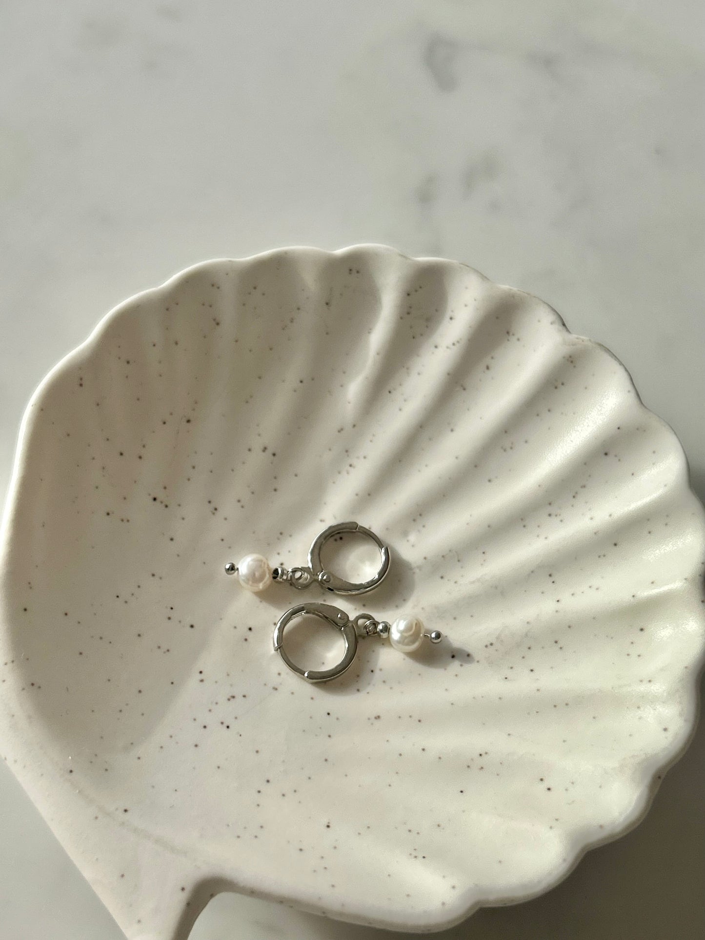 TINY FRESHWATER PEARL HUGGIE EARRINGS IN PLATINUM