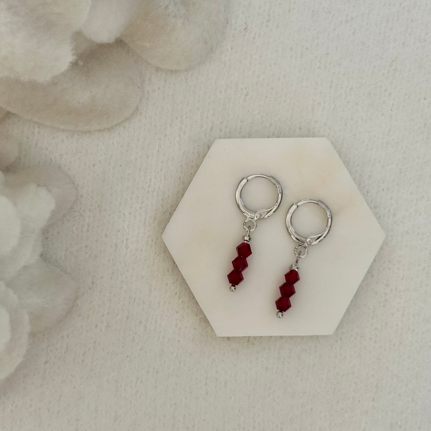 MILLIE RED HUGGIE EARRINGS IN PLATINUM