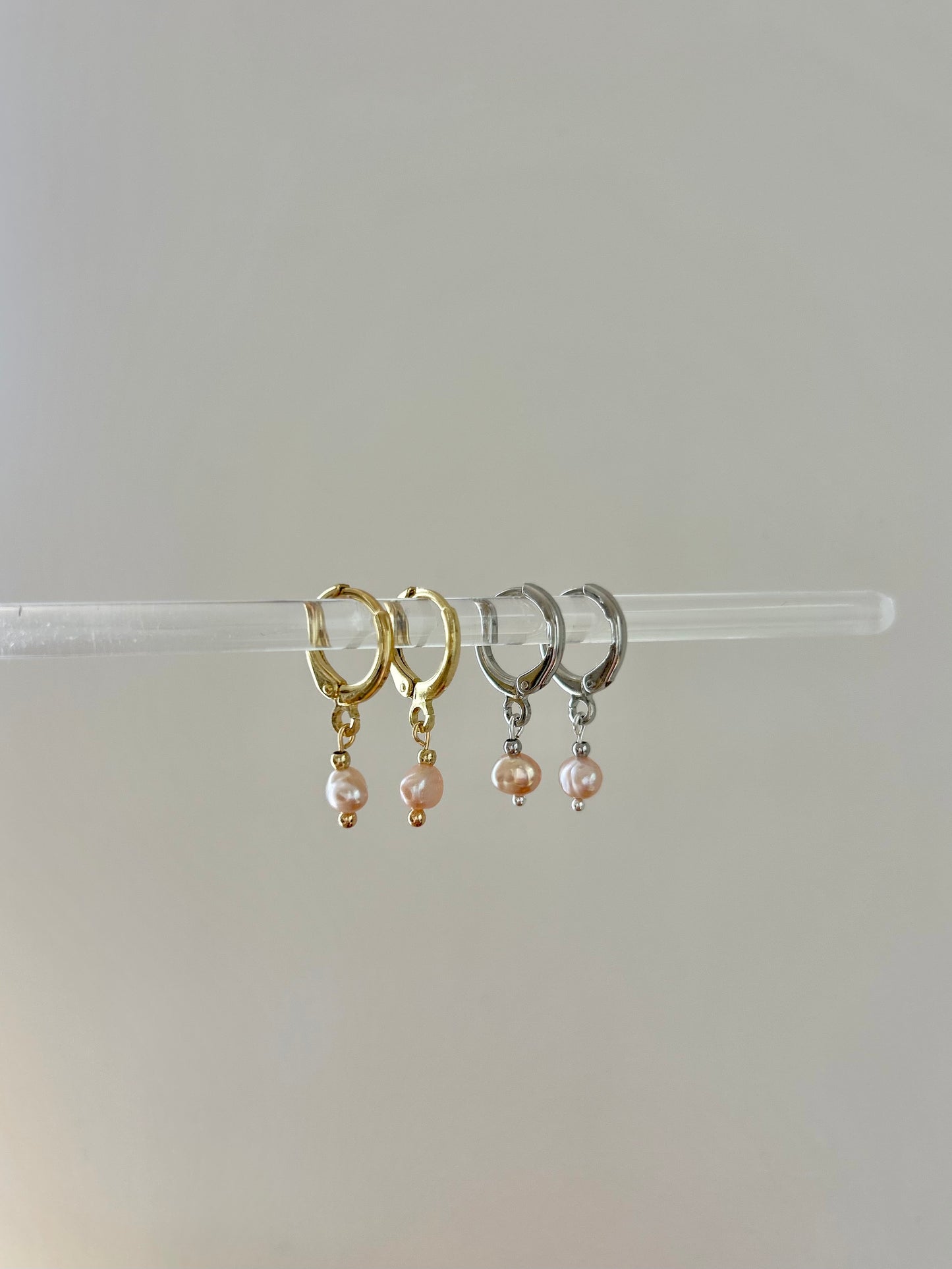 TINY FRESHWATER PINK PEARL HUGGIE EARRINGS IN PLATINUM
