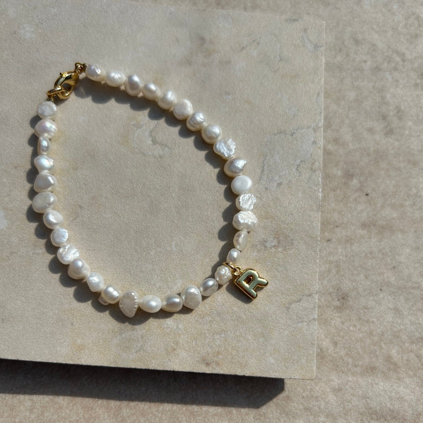 EVA PEARL INITIAL BRACELET IN 18K GOLD