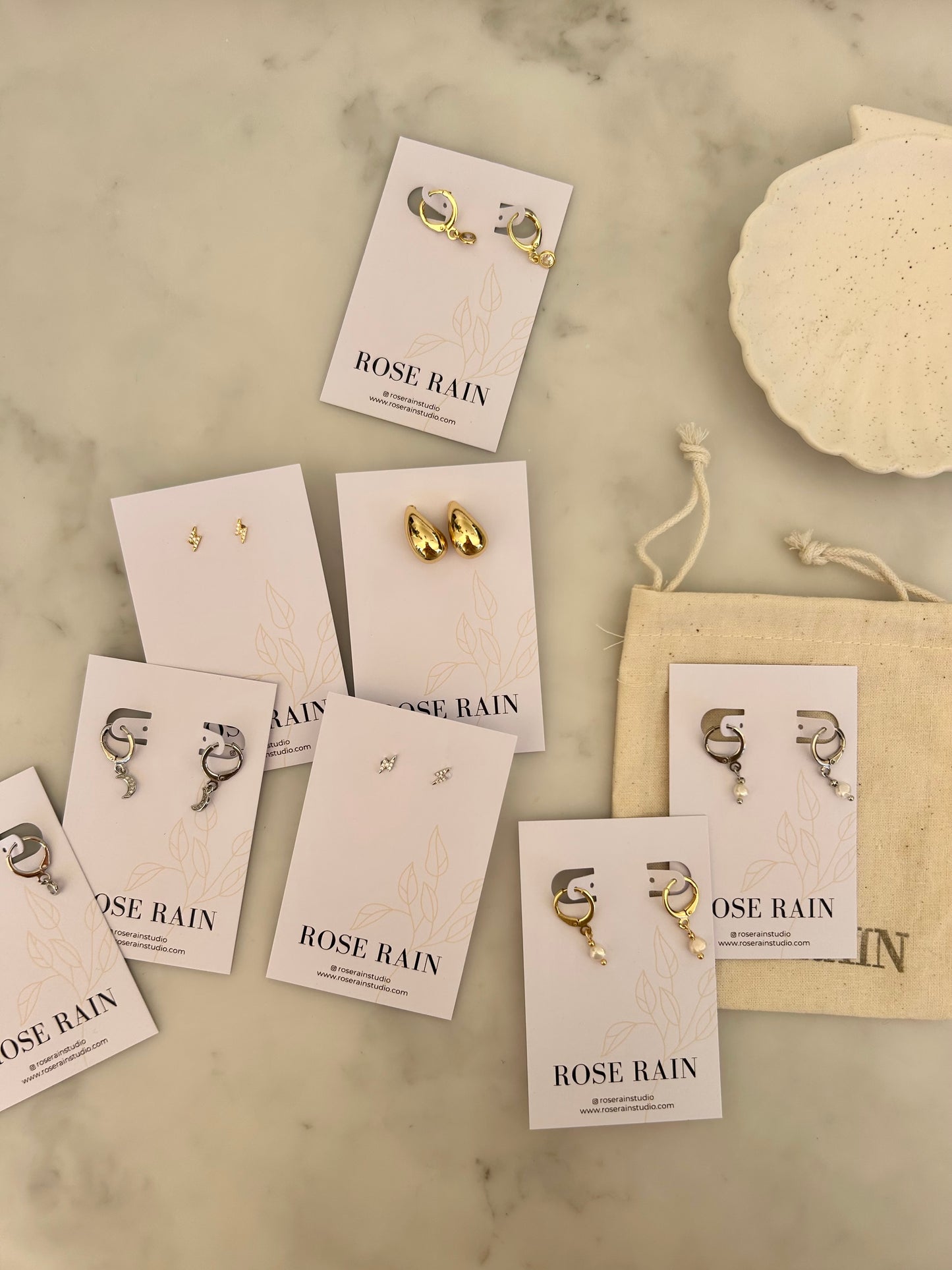 TINY DROP HUGGIE EARRINGS IN 18K GOLD