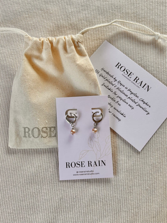 TINY FRESHWATER PINK PEARL HUGGIE EARRINGS IN PLATINUM