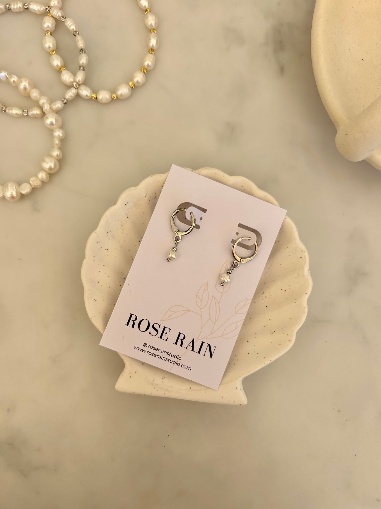 TINY FRESHWATER PEARL HUGGIE EARRINGS IN PLATINUM