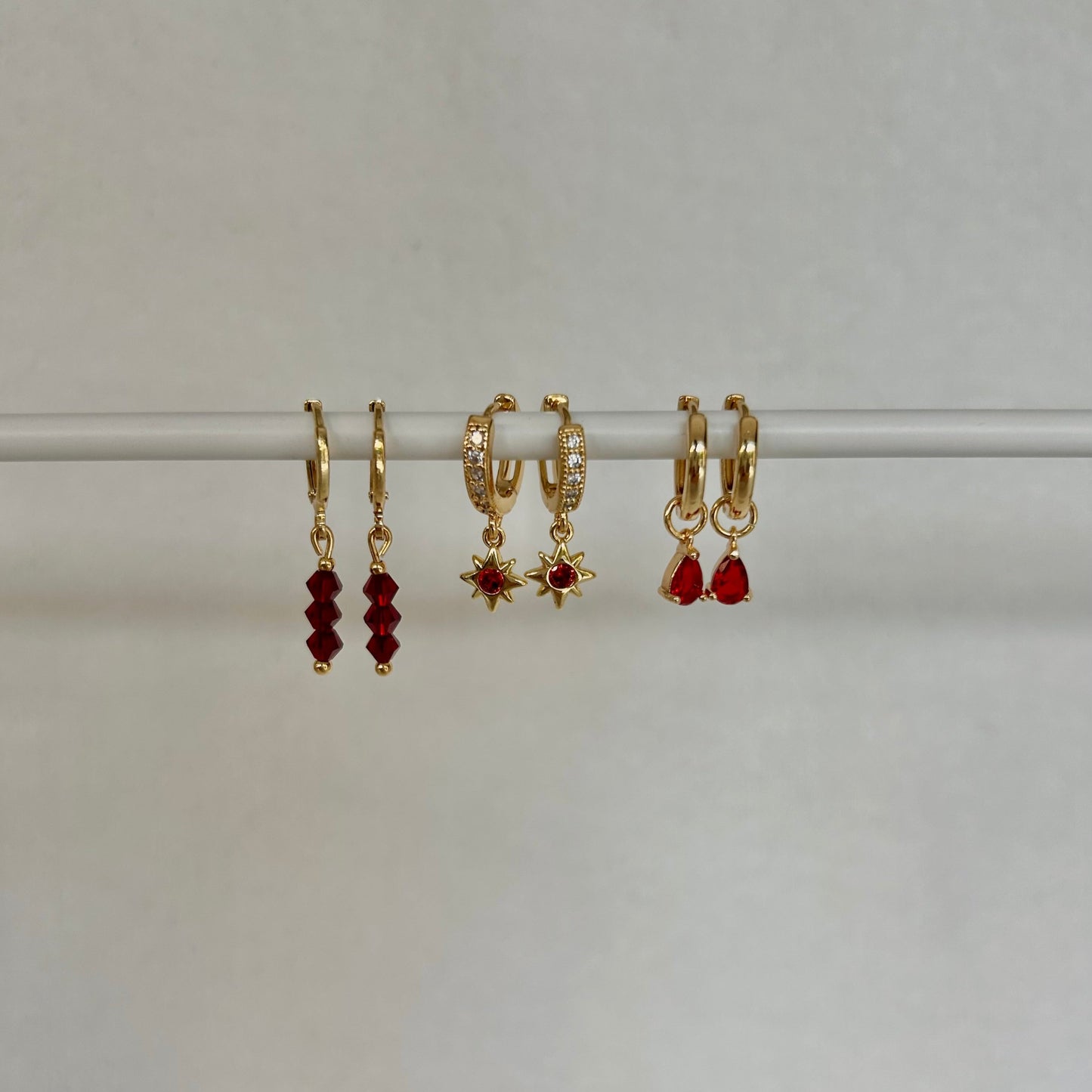 MILLIE RED HUGGIE EARRINGS IN 18K GOLD