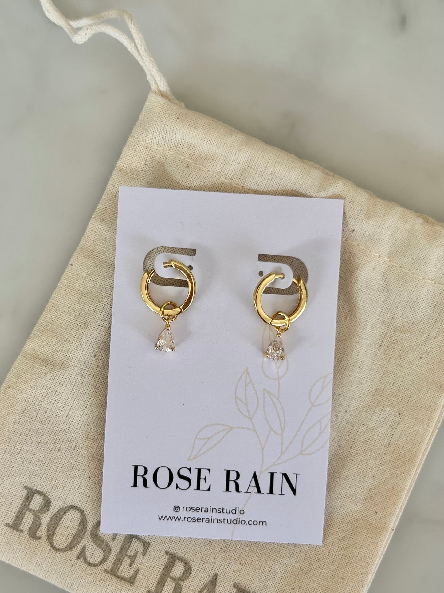 DETACHABLE WHITE TEARDROP CHARM HUGGIE EARRINGS IN 18K GOLD