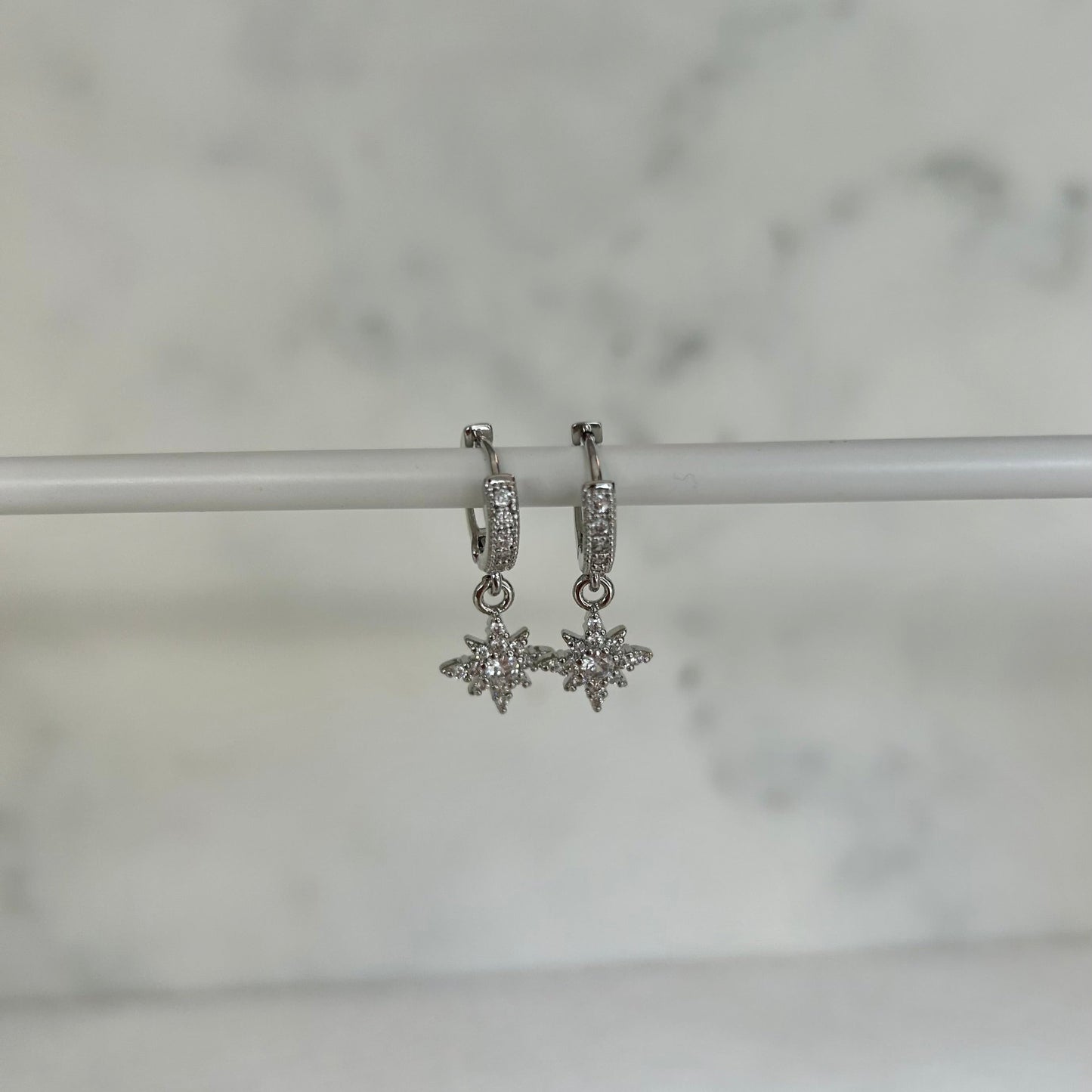 STAR GAZER HUGGIE EARRINGS IN PLATINUM