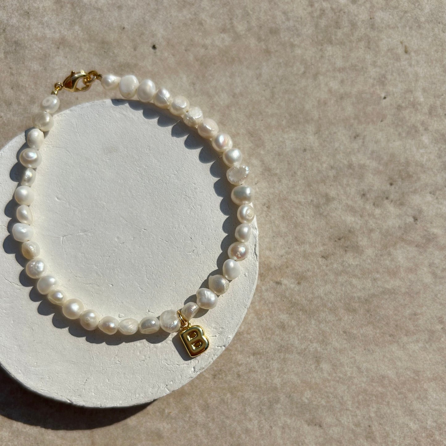 EVA PEARL INITIAL BRACELET IN 18K GOLD