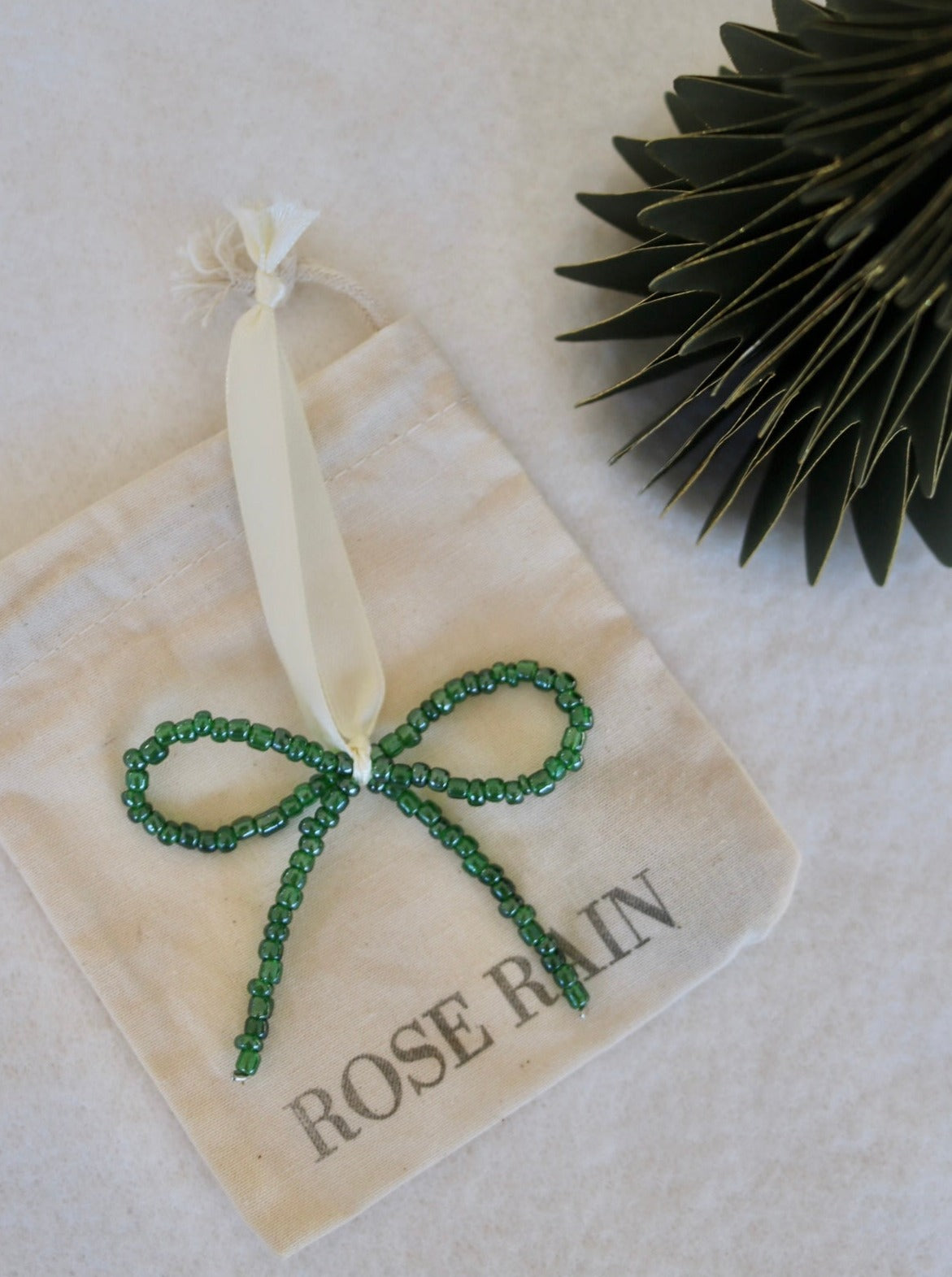 BOW DECORATION IN GREEN