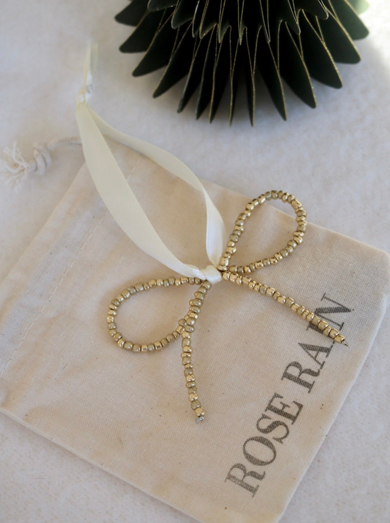 BOW DECORATION IN GOLD