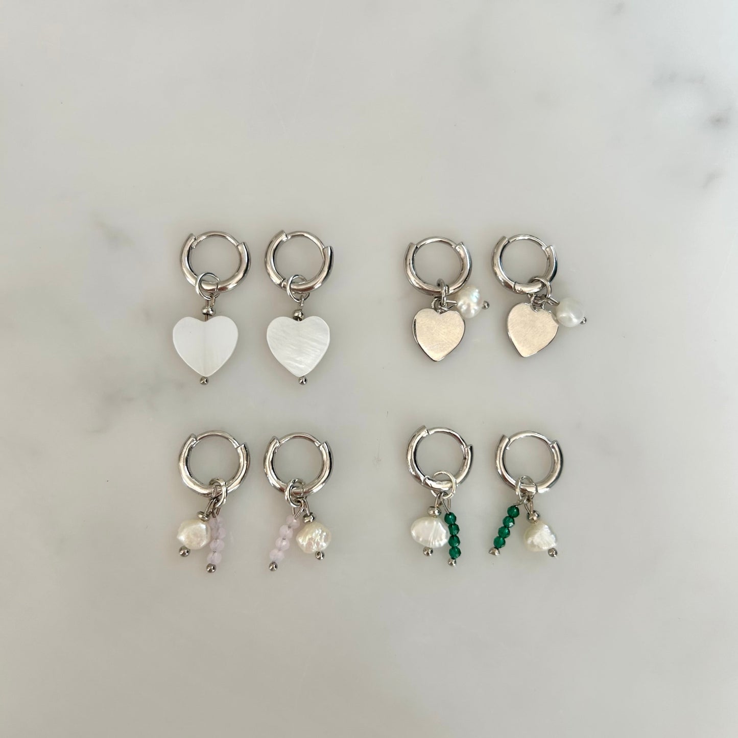 DETACHABLE SHELL HEART CHARM HUGGIE EARRINGS IN PLATINUM