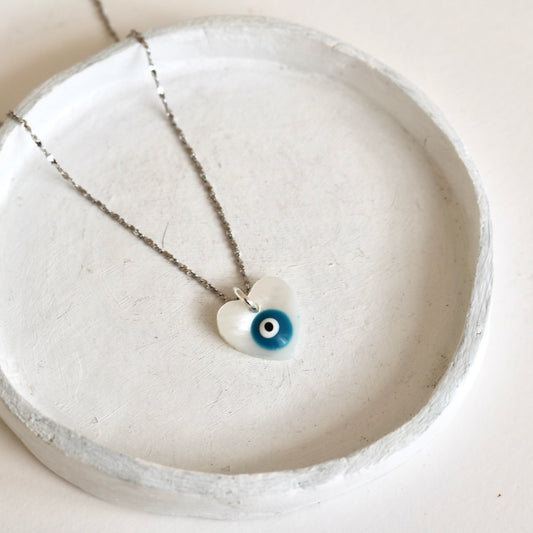 EVIL EYE FRESHWATER SHELL HEART NECKLACE IN PLATINUM