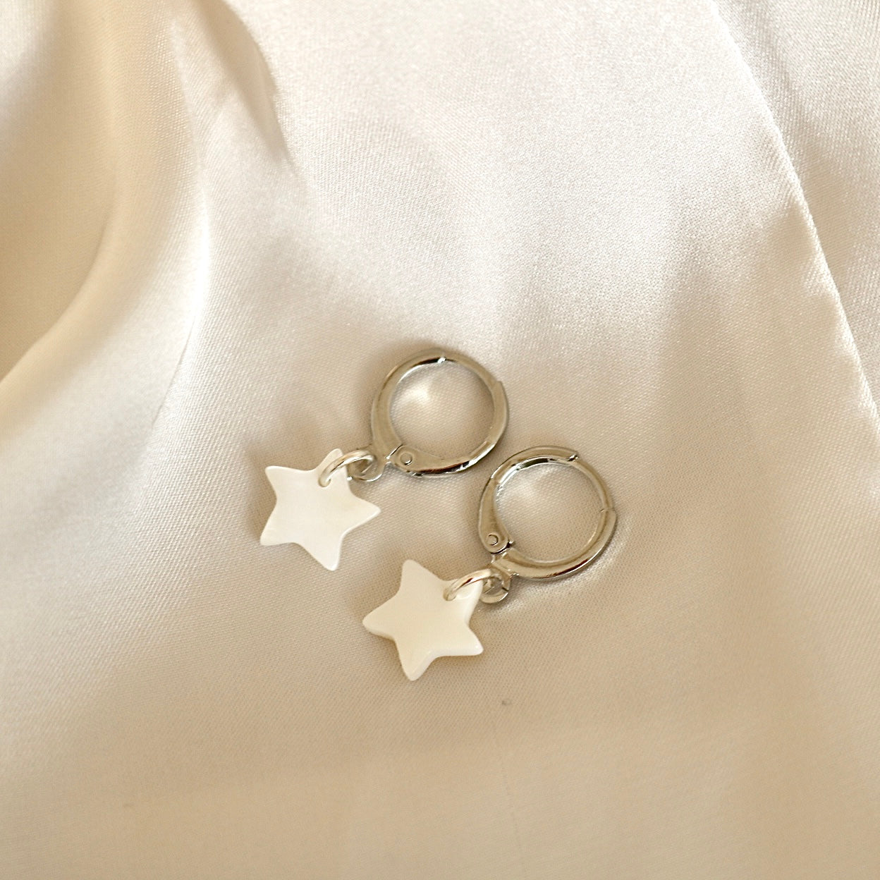 FRESHWATER SHELL STAR HUGGIE EARRINGS IN PLATINUM