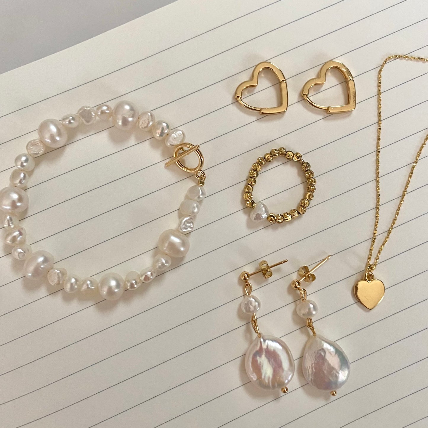 HEART HOOPS IN 18K GOLD