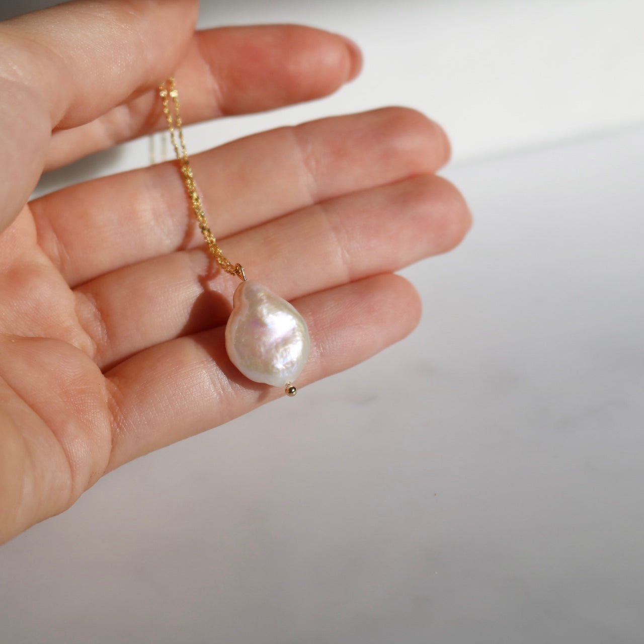 BAROQUE PEARL NECKLACE IN 18K GOLD