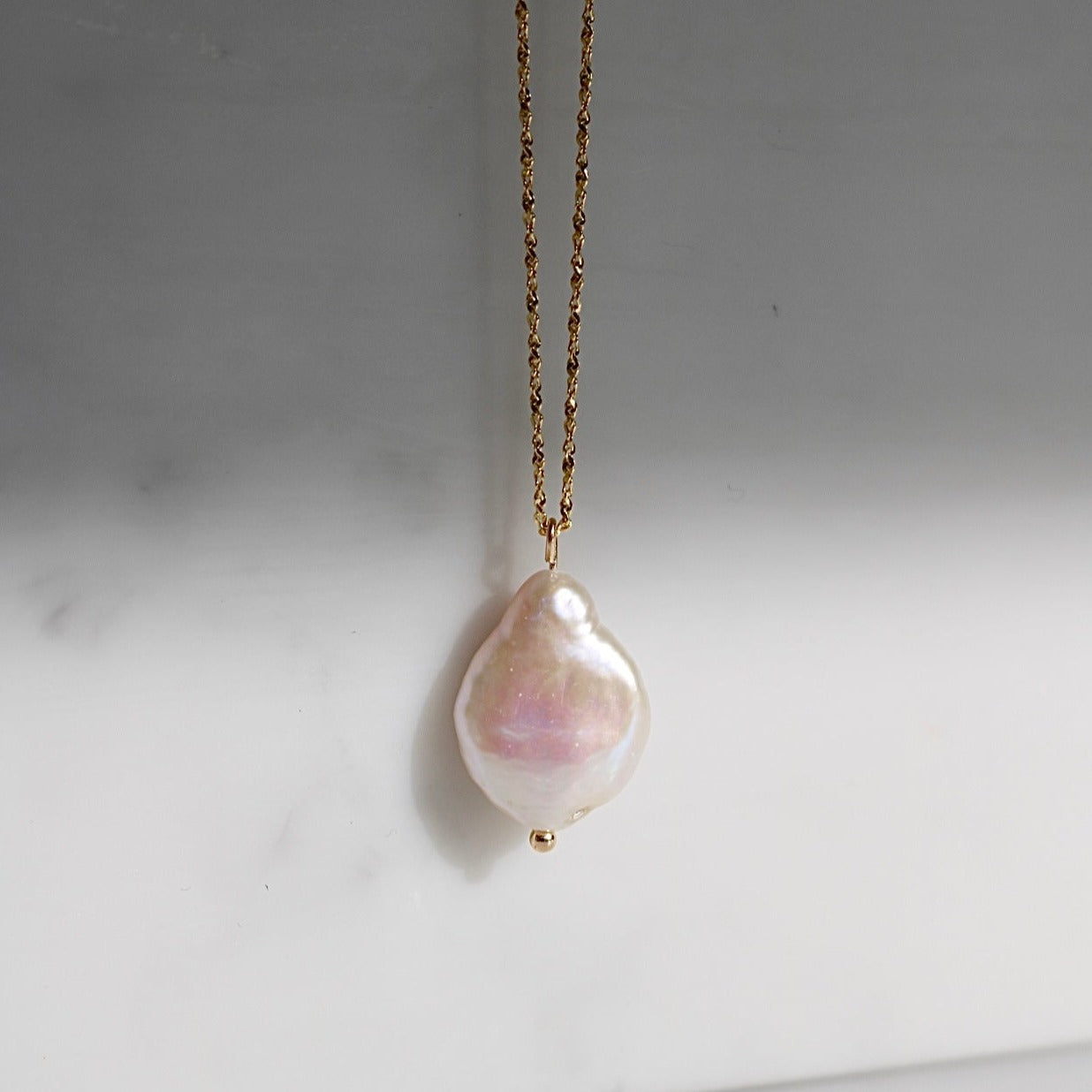 BAROQUE PEARL NECKLACE IN 18K GOLD