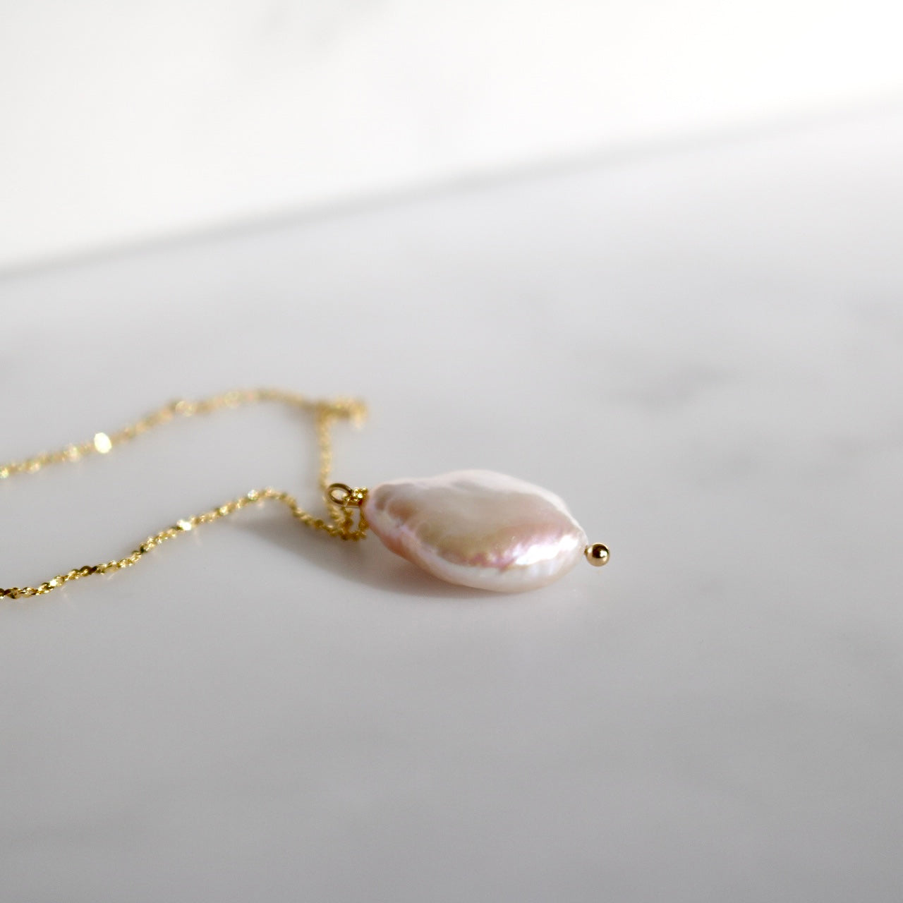 BAROQUE PEARL NECKLACE IN 18K GOLD