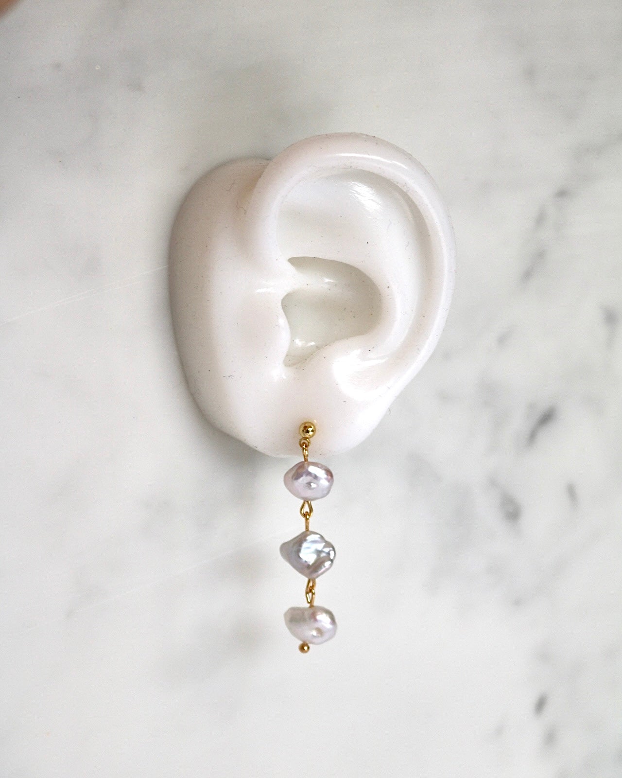 ARIEL DANGLE PEARL STUDS IN 18K GOLD