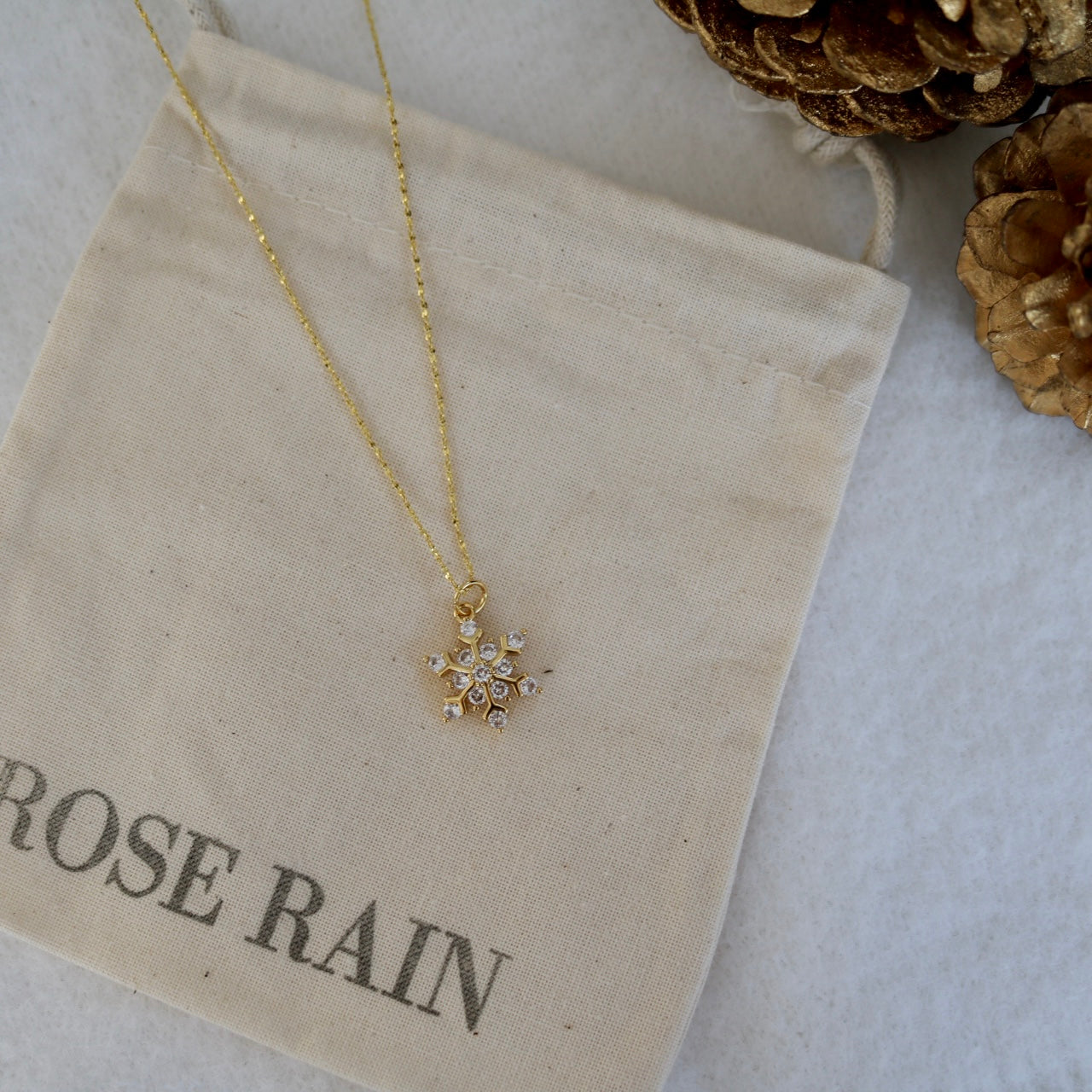 SNOWFLAKE NECKLACE IN 18K GOLD