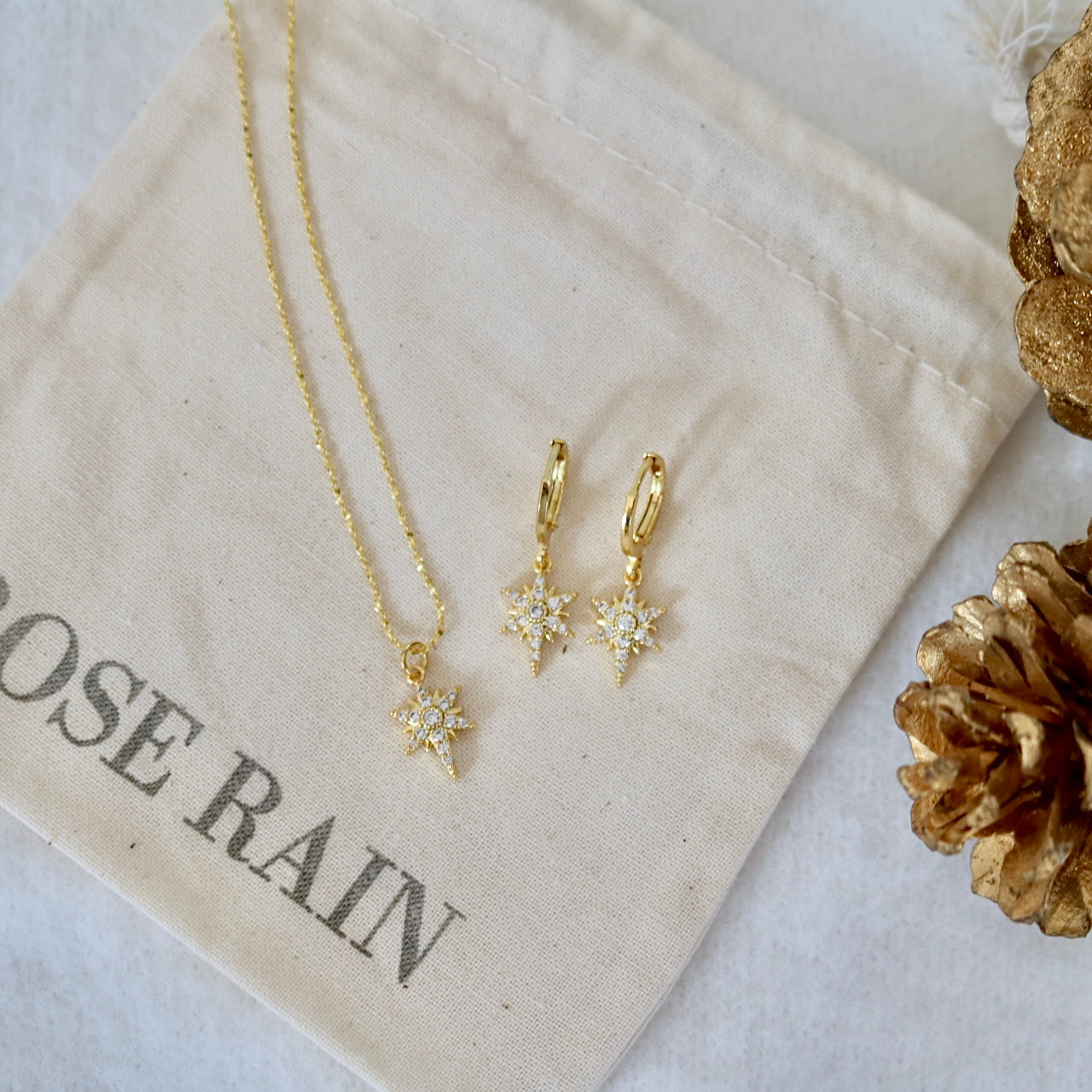 STAR GAZER HUGGIE EARRINGS IN 18K GOLD