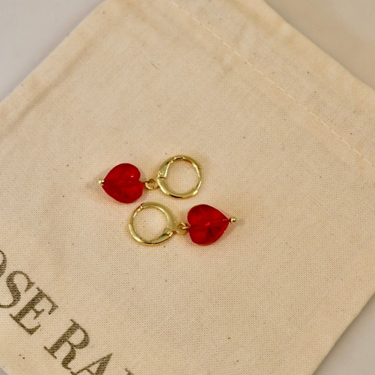 RED LOVE HEART HUGGIES IN 18K GOLD