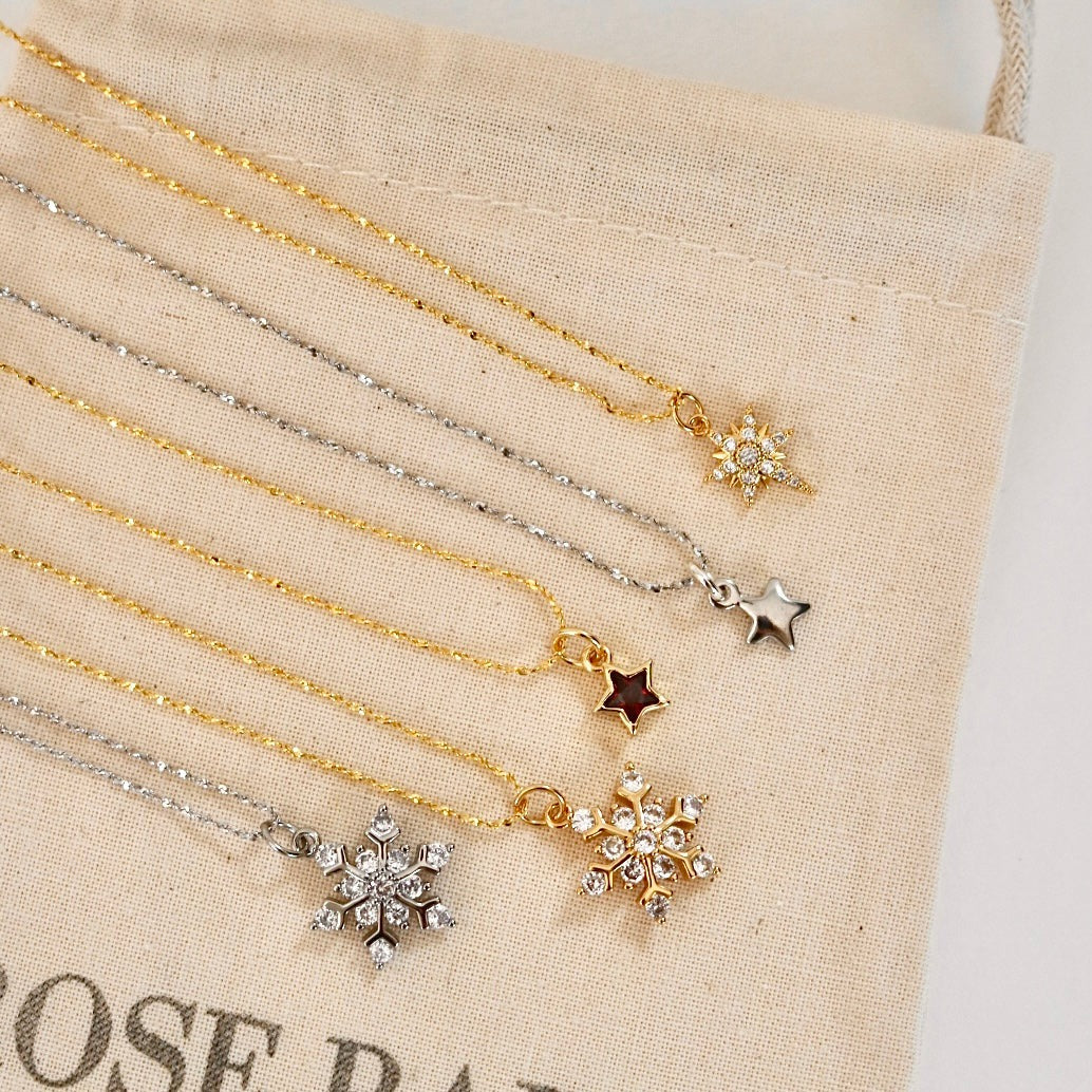 TINY STAR NECKLACE IN PLATINUM