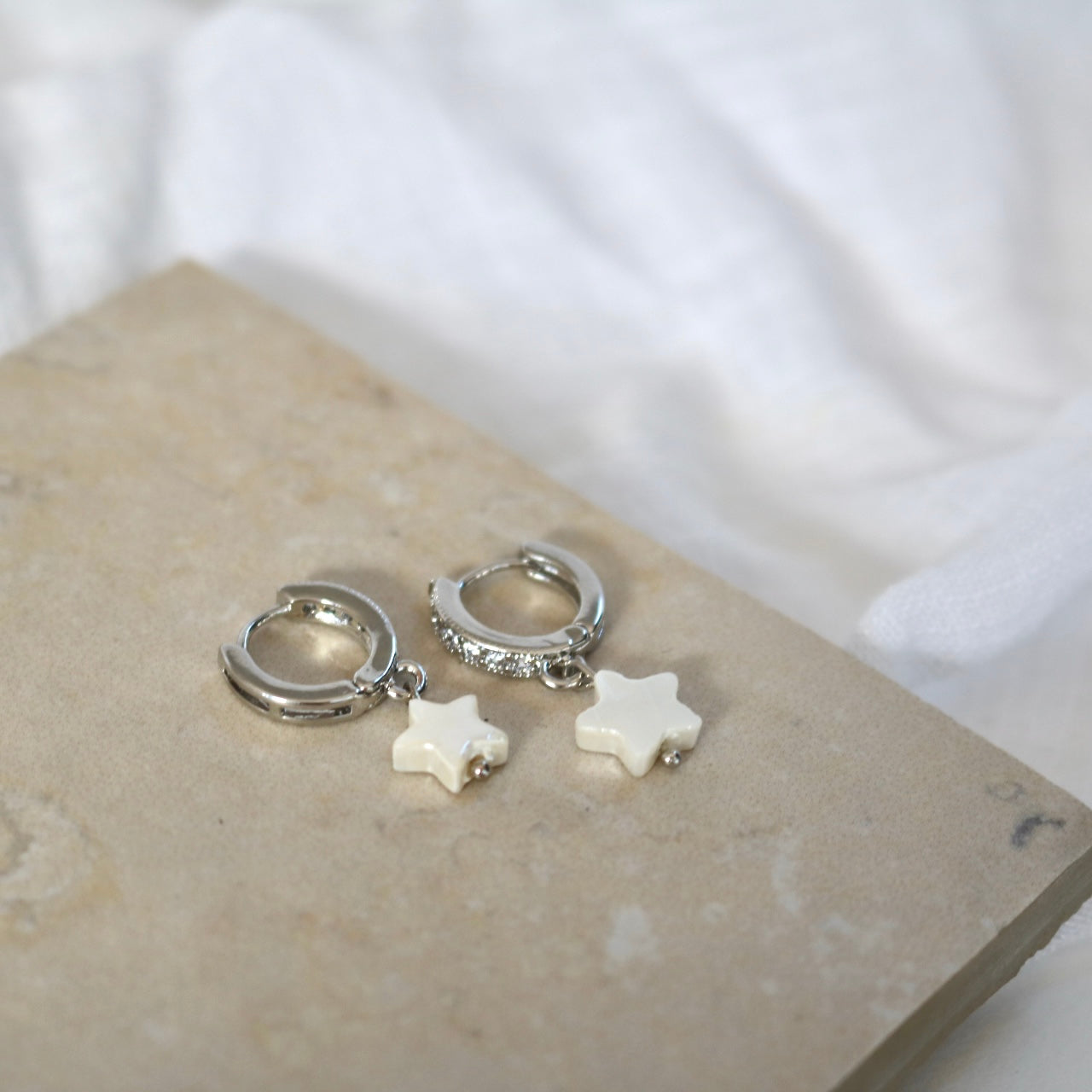 FRESHWATER SHELL STAR HUGGIE EARRINGS IN PLATINUM