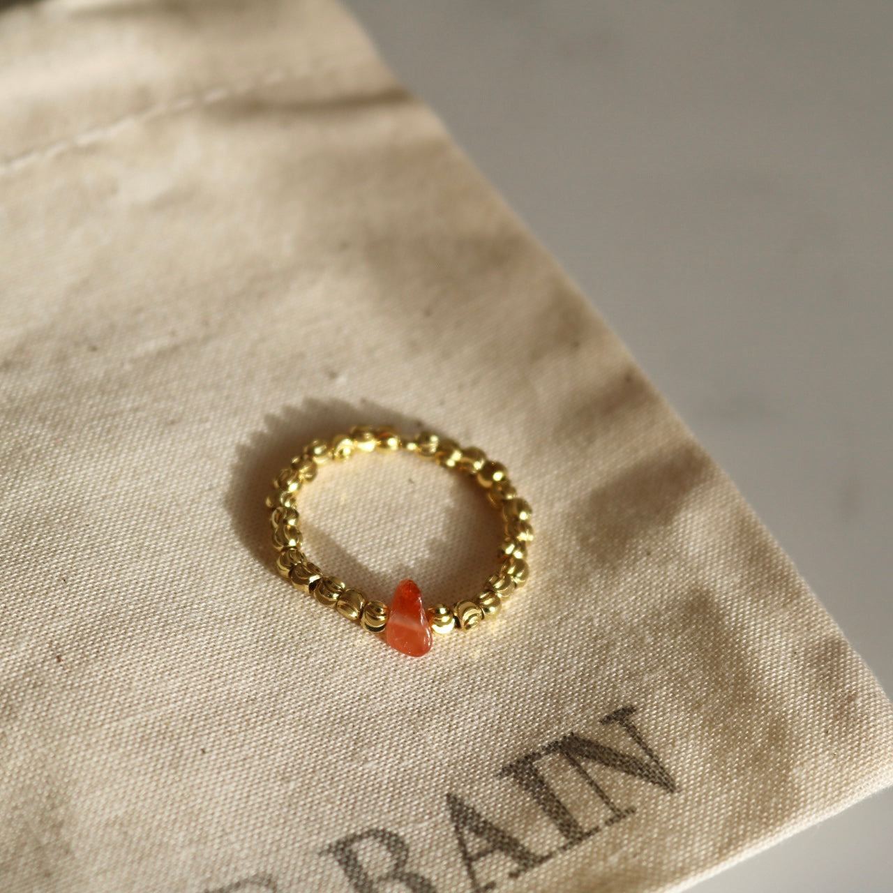 RED AGATE BEAD RING IN 18K GOLD