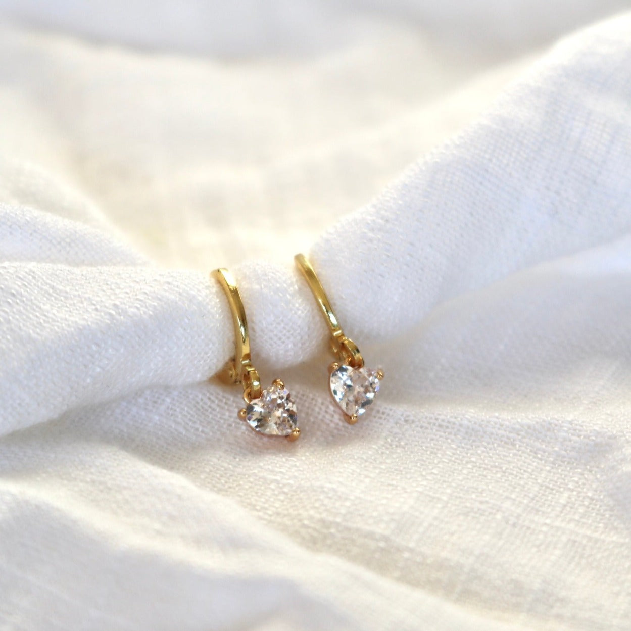 CLIP ON TINY HEART HUGGIE EARRINGS IN 18K GOLD