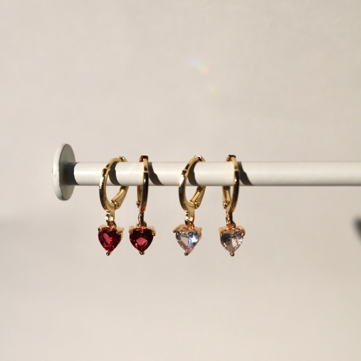 TINY RED HEART HUGGIE EARRINGS IN 18K GOLD