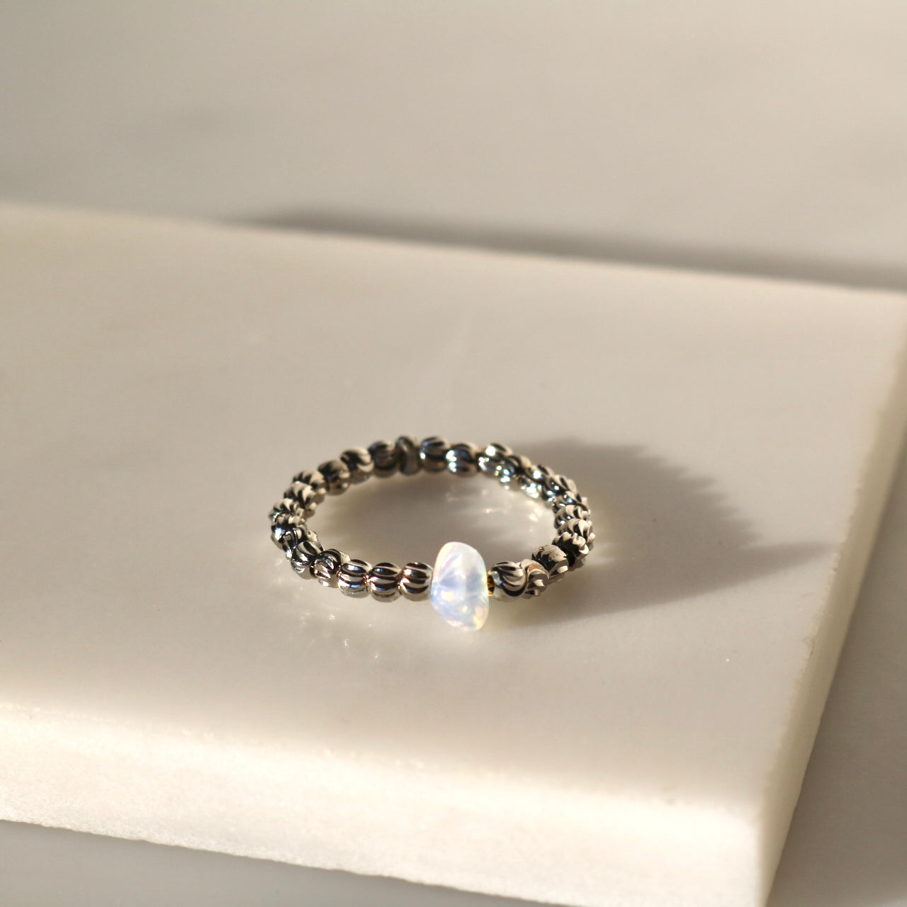 OPAL BEAD RING IN PLATINUM