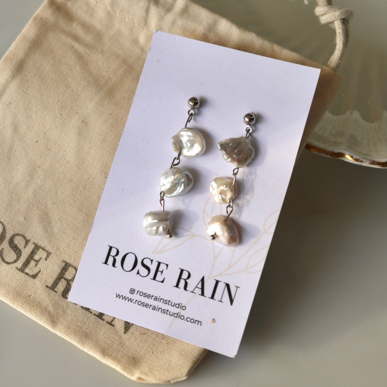 ARIEL DANGLE PEARL STUDS IN PLATINUM