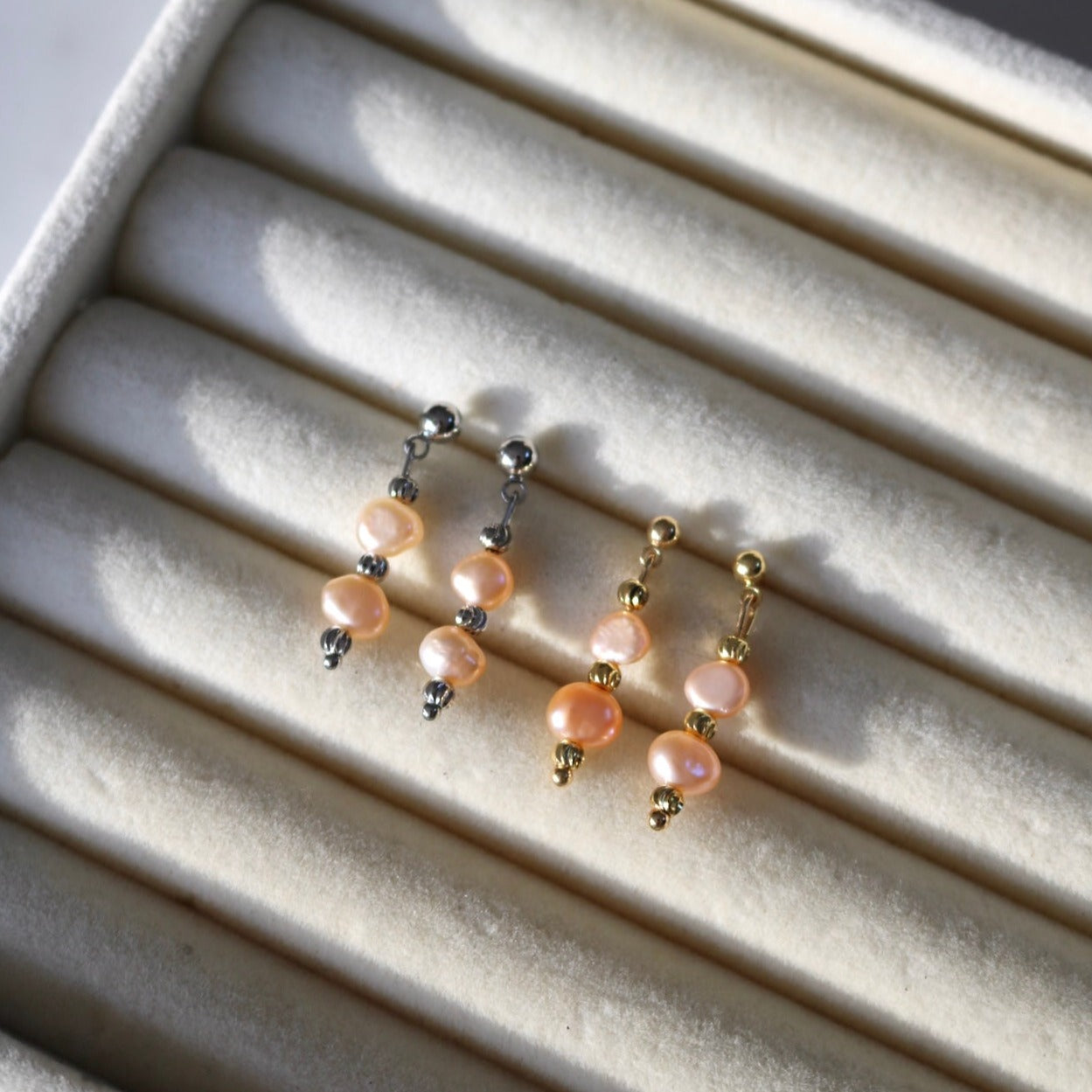 SUNRISE PINK FRESHWATER PEARL STUDS IN PLATINUM